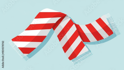 A vibrant red and white striped scarf elegantly draped and flowing against a soft light blue background suggesting warmth and winter fashion