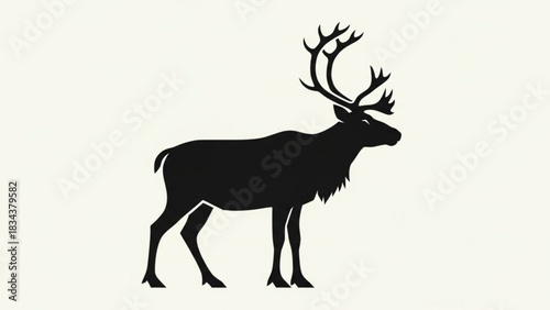 A striking black silhouette of a majestic reindeer with large branching antlers stands proudly against a plain off white background symbolizing nature and the wild