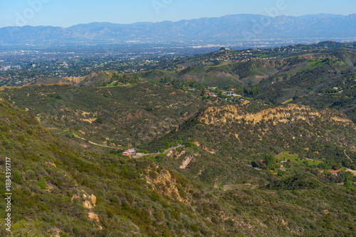 Red Rock Canyon Park Hills Overlooking Distant Valley City on a Clear Day