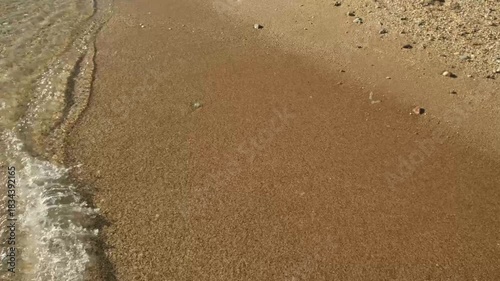 waves on the sandy shore