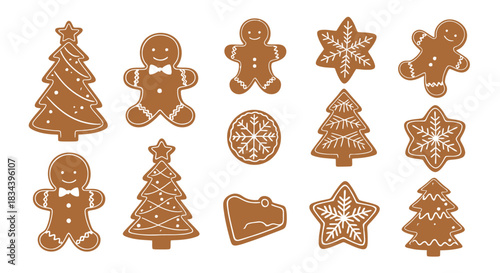 Collection of various delicious Christmas gingerbread cookies in festive shapes like trees, stars, and snowflakes