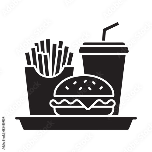 Fast food meal with burger fries and drink on tray