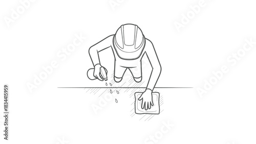 Construction Worker Cleaning Floor with Cloth and Spray Bottle
