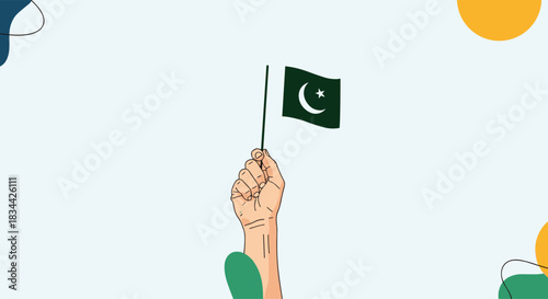 Proudly holding the national flag of Pakistan, a hand gestures patriotism and national pride, set against a decorated background.