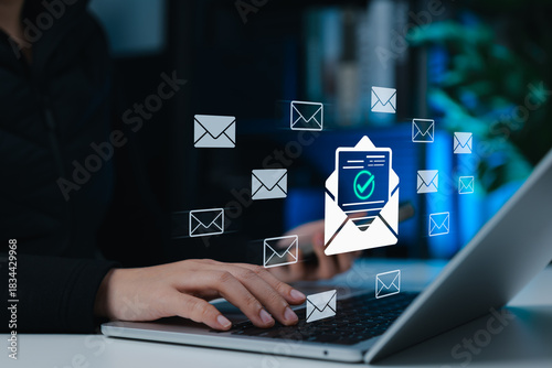 Photography Verified email communication and digital messaging concept, showing a woman usin