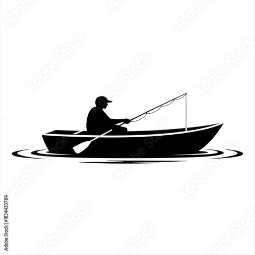 Silhouette of a person fishing from a rowboat on calm water
