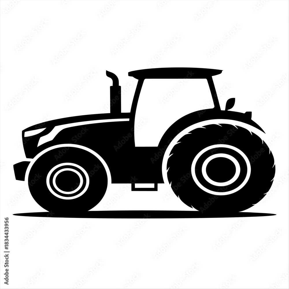 Obraz premium Silhouette of a modern farm tractor