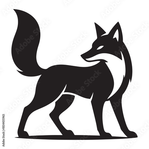 Fox standing proud with flowing tail under calm evening sky.