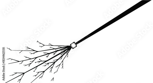Whimsical witch's broomstick crafted from natural twigs and a dark handle against a white background.