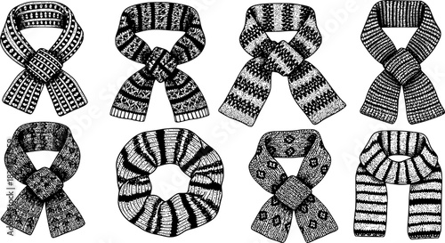 Eight intricately patterned black and white scarves are shown, each arranged in a different style and knot, showcasing detailed knit textures.
