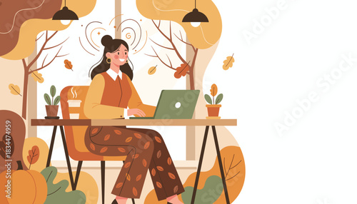 Freelancer working on laptop with cozy autumn vibes