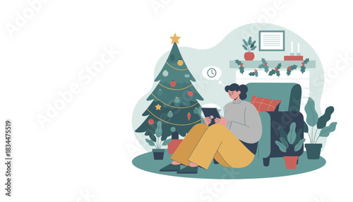 Woman using tablet device in a cozy living room decorated for Christmas and winter holidays