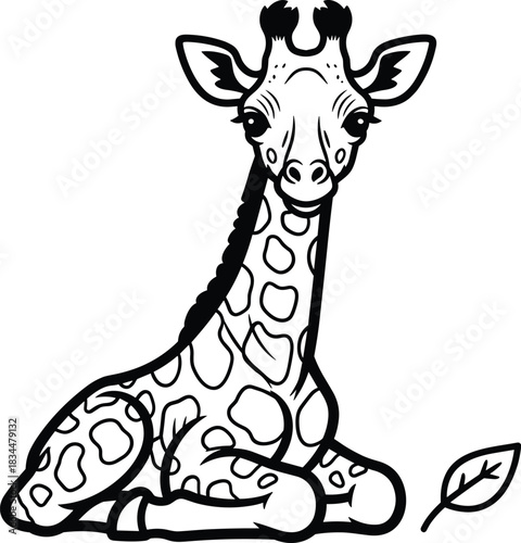 Adorable baby giraffe sitting peacefully with a single leaf nearby