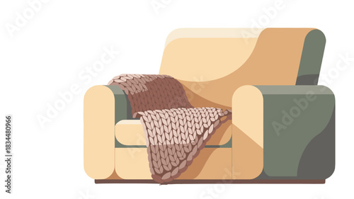 Cozy armchair with blanket.