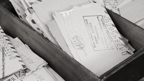 Vintage postal paper letters in the box. Stamp on the envelope: 