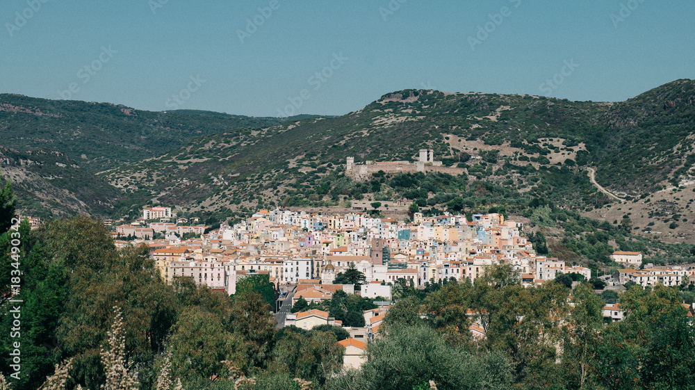Fototapeta premium Panoramic View of Mediterranean Town in Mountain Valley