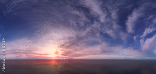 Photos Sunset Over Calm Ocean With Pink Purple Sky Reflections and Cloudscape