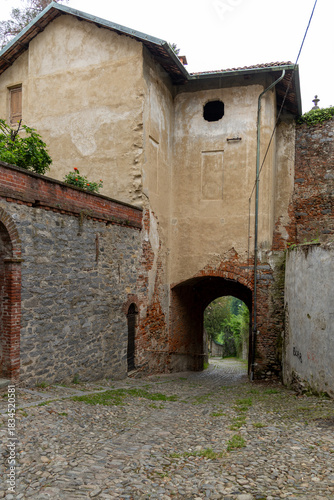An ancient and evocative medieval gate located in the Borgo del Piazzo, the historic district of Biella, Piedmont.