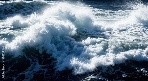 Fototapeta Naklejka Na Ścianę i Meble -  Powerful ocean waves crashing with white foam and turbulent blue sea
