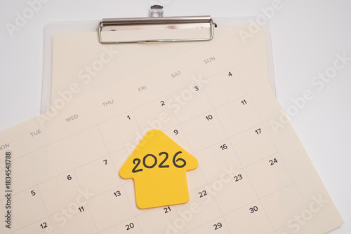 Yellow 2026 sticker on a calendar. Planning for the future. 