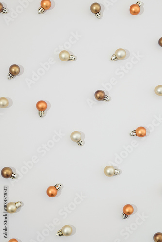 Holiday Christmas baubles on a white cloud backgroud.