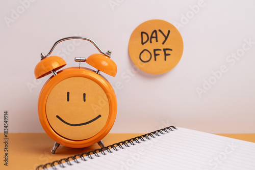 Day off - workplace message in the office. Concept of absence from work and day off