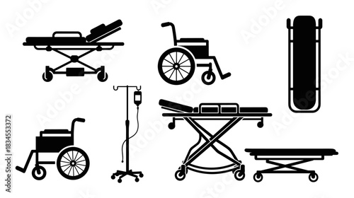 Collection of black silhouette medical equipment icons including a gurney, wheelchair, stretcher, and IV stand for hospital and emergency care concepts in a clean vector style