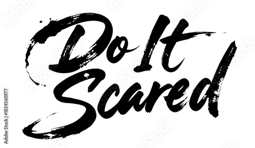Bold brush lettering “Do It Scared” in expressive black style