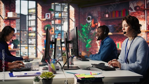 Call center employee handling customer complaints, offering helpful solutions to their concerns. Customer service agent providing helpful information related to products or services, camera B