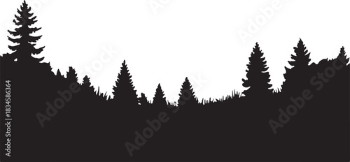 Silhouette of a dense forest landscape with evergreen trees