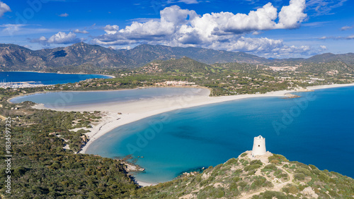 Fototapeta Naklejka Na Ścianę i Meble -  Aerial view of Porto Giunco beach and tower, Villasimius, Sardinia, Italy, Europe
