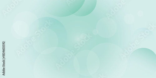 Soft light green abstract background with translucent bokeh circles and gentle gradient effect.