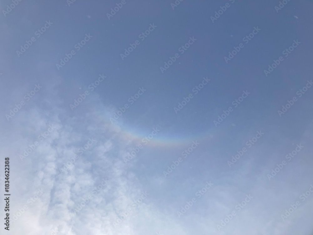 Fototapeta premium Delicate atmospheric halo above soft clouds