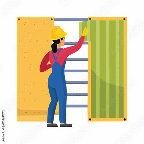 A construction worker, wearing a yellow helmet and overalls, carefully installs wallpaper on a wall, demonstrating professional craftsmanship.