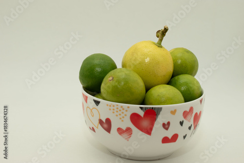 Fresh green fruits in decorative bowl
