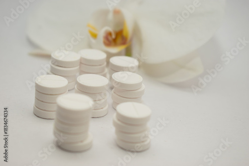 White tablets on clean background