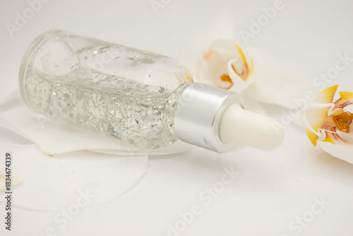 Anti-aging facial serum in glass dropper bottle