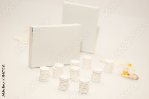 White tablets on clean background