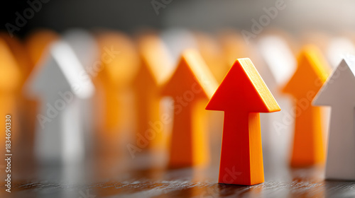 Orange arrows stand out amongst white arrows, symbolizing leadership and exceeding expectations in a business setting.