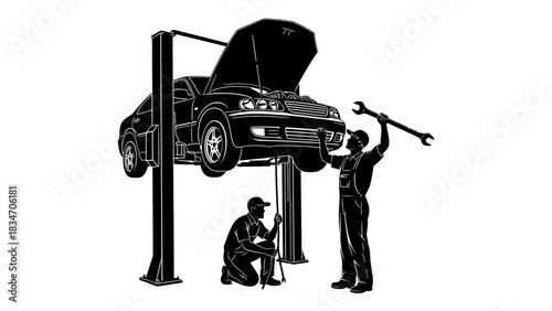 Automobile repair shop with two mechanics working on a car hoisted on a lift