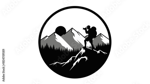 Silhouette of a photographer with a backpack on a mountain peak, capturing the sunrise over a forest and mountains.