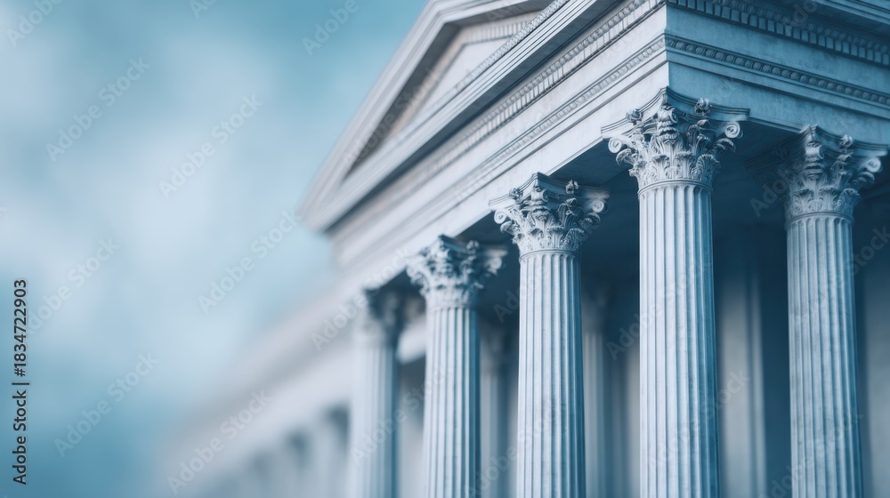 Naklejka premium A close-up view of classical columns and architectural details, showcasing elegance and sophistication in a monumental structure.