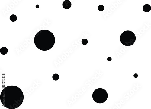 Black circles of various sizes scattered randomly on a white background