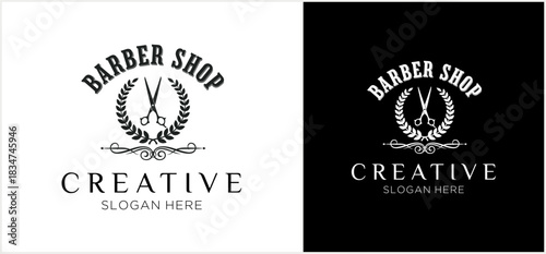 Barber shop logo design with scissors, laurel wreath, and decorative elements.