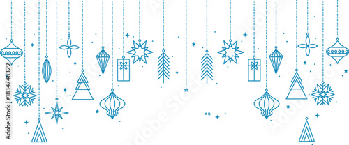 Elegant blue christmas ornaments hanging on strings against white background