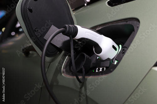 The power plug is charging the EV Car