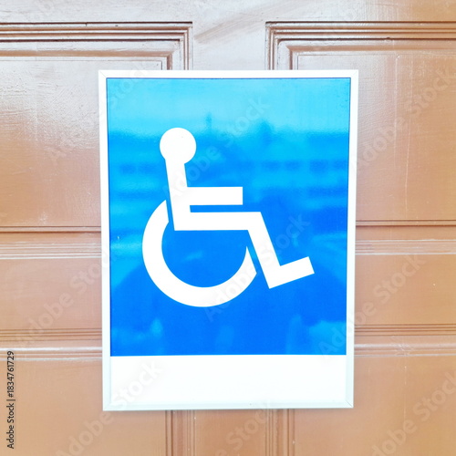 Blue Wheelchair Accessibility Sign for Public Facilities and Inclusive Service Areas