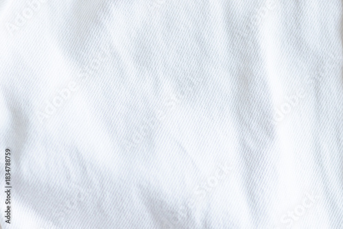 Close up of white fabric with subtle shadows and texture. Trendy color of 2026 year