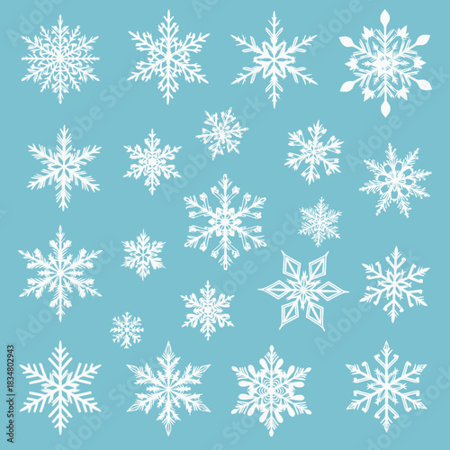 Elegant White Snowflakes Seamless Pattern on Textured Blue Winter Background