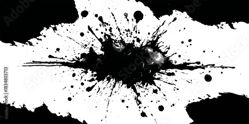 Explosive black ink splatter on white background abstract art